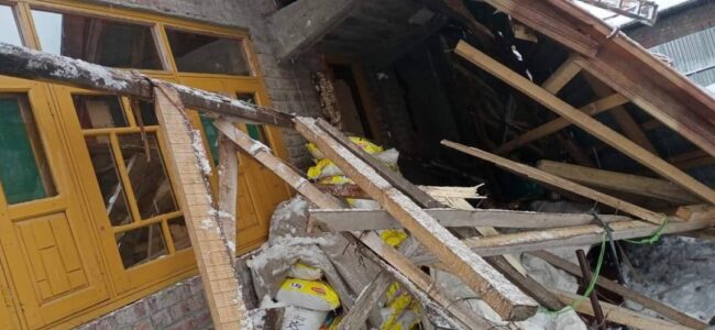 Snowfall damages residential house in Ganderbal