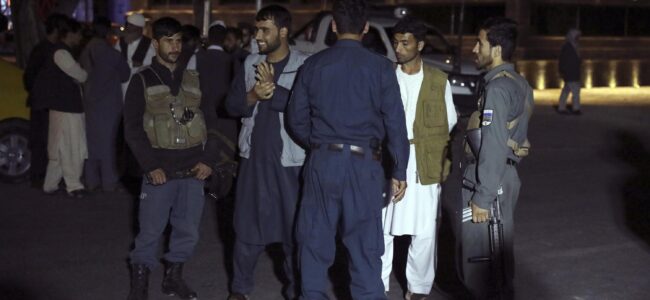 Suicide truck bomber hits Afghan guest house, killing 14