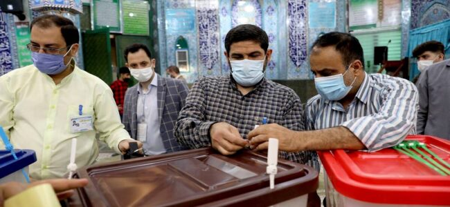 Iran votes in presidential poll tipped in hard-liner’s favour