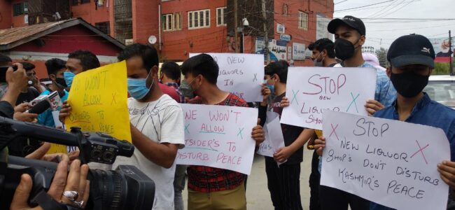Youngsters stage protest, seek closure of liquor shops in Srinagar Youngsters stage protest, seek closure of liquor shops in Srinagar