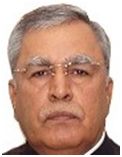 Advisor Farooq Khan congratulates Chess player Advisor Farooq Khan congratulates Chess player