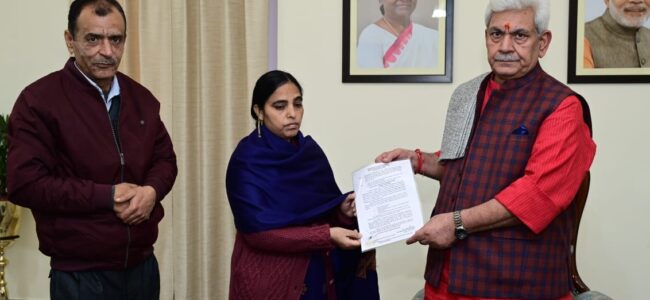 Lt Guv hands over appointment letter to widow of a slain Kashmiri Pandit