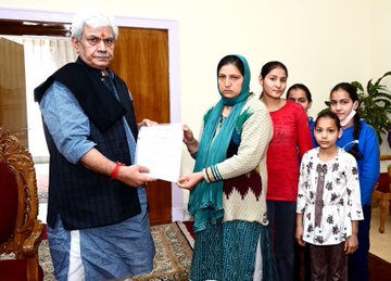 Lt Guv hands over job appointment letter to wife of slain Kashmiri Pandit