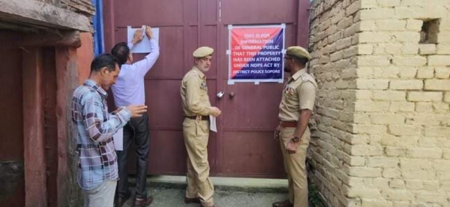 Property acquired through proceeds of illicit drug trafficking attached
