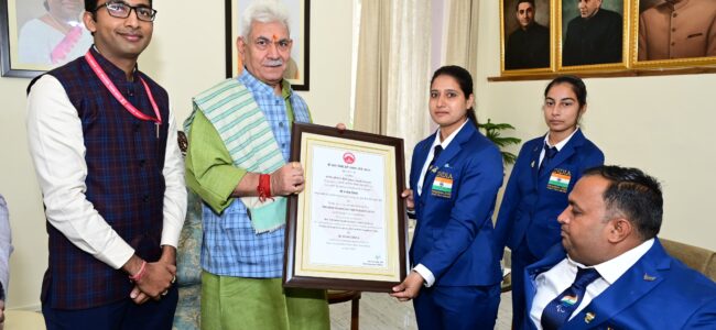 Lt Governor Presents Certificate of Excellence Award to Para Archers, coach