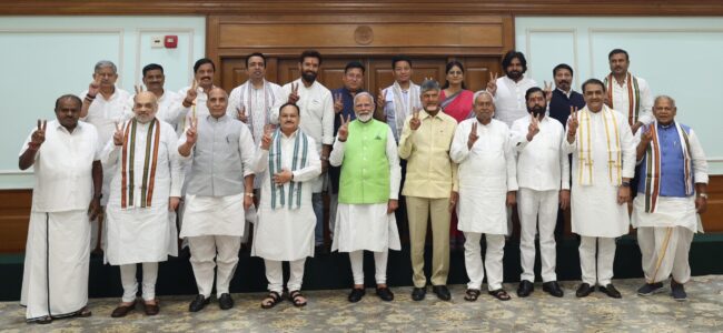 NDA MPs arrive to elect Modi as their leader NDA MPs arrive to elect Modi as their leader