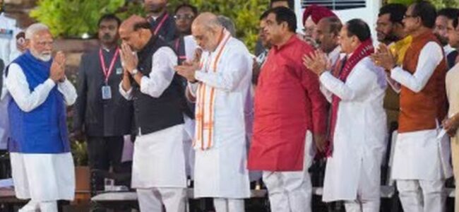 Amit Shah retains home ministry, Rajnath Singh defence Amit Shah retains home ministry, Rajnath Singh defence