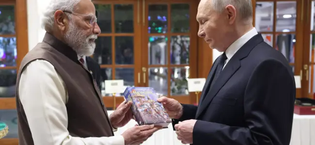 PM Modi presents copy of Gita in Russian to Putin PM Modi presents copy of Gita in Russian to Putin