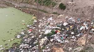 Irrigation canal turns dumping site in Shopian, allege locals