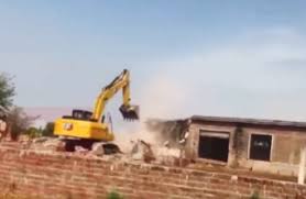 Three houses of drug peddlers demolished under anti-drug campaign