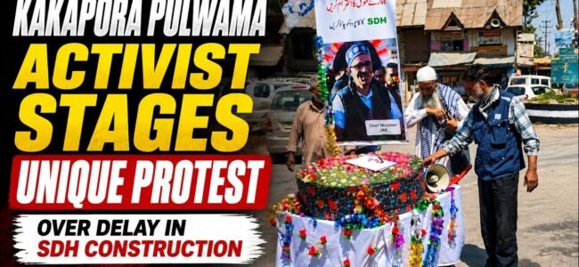 Kakapora social activist stages unique protest, demands completion of SDH project Kakapora social activist stages unique protest, demands completion of SDH project