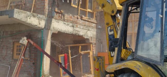 Police demolish illegal structure belonging to drug peddler