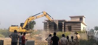 Houses of two drug peddlers demolished in Jammu Houses of two drug peddlers demolished in Jammu