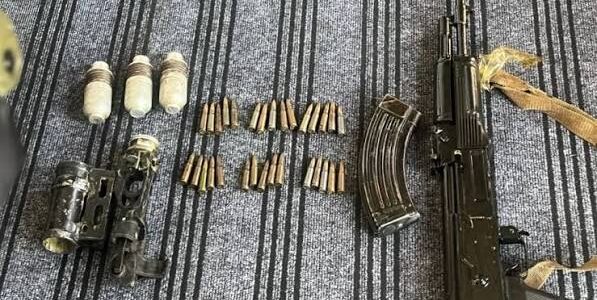 AK-47, hand grenades, UBGL recovered during CASO in Sopore, north Kashmir AK-47, hand grenades, UBGL recovered during CASO in Sopore, north Kashmir